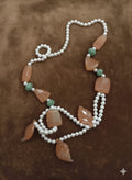 Collana di perle e pietre preziose